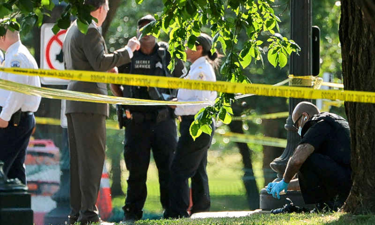 US Secret Service exchanged  gunfire with armed suspect